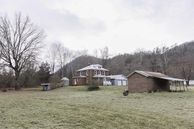 view of yard with a carport