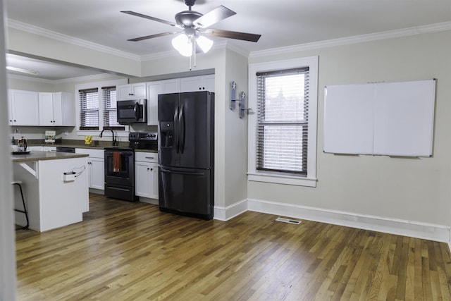 kitchen with range with electric cooktop, a breakfast bar, dark hardwood / wood-style floors, white cabinetry, and black refrigerator with ice dispenser