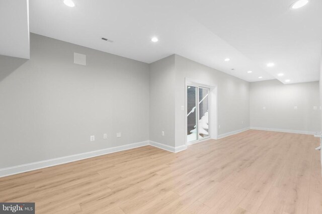 empty room featuring hardwood / wood-style flooring