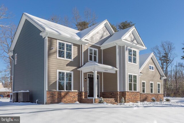 view of front of house featuring central AC unit