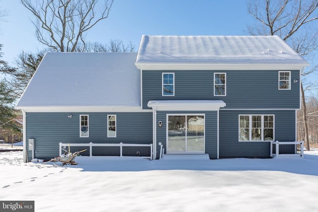 view of snow covered property