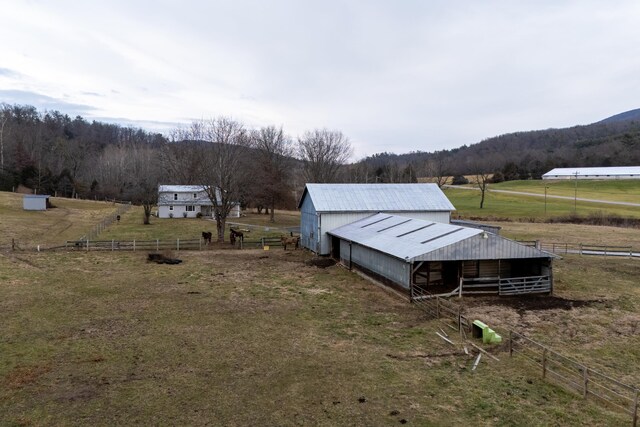 exterior space with a rural view