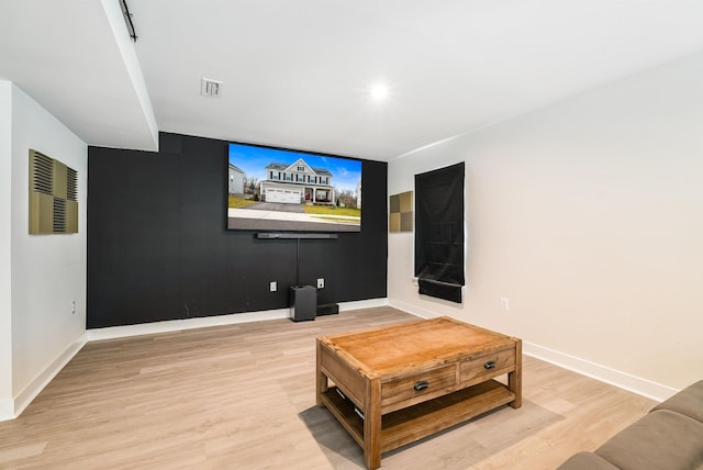 living room with light hardwood / wood-style flooring