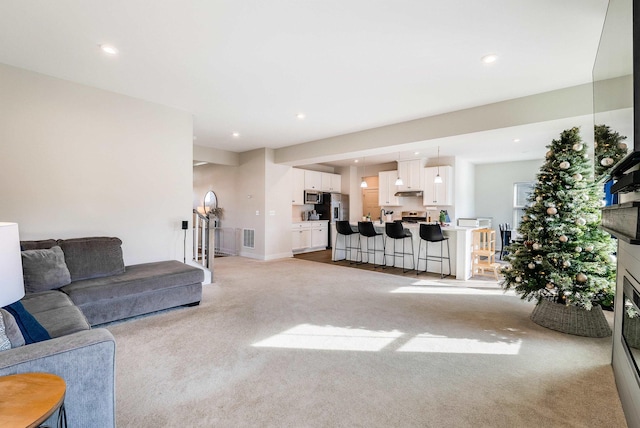 living room with light carpet