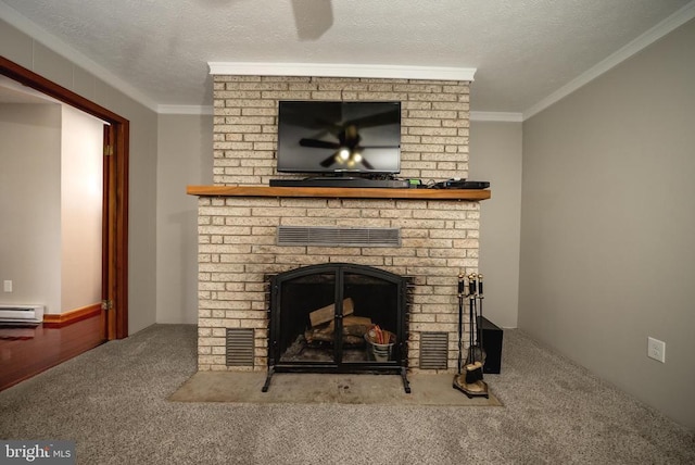 details with carpet floors, visible vents, a baseboard heating unit, ornamental molding, and a textured ceiling