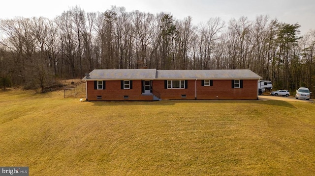 single story home featuring crawl space, brick siding, and a front lawn