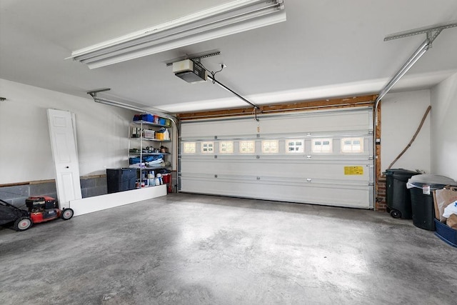 garage featuring a garage door opener