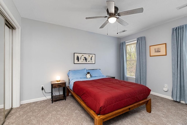 bedroom featuring carpet, visible vents, and baseboards