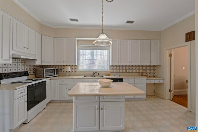 kitchen featuring crown molding, white cabinetry, a kitchen island, decorative light fixtures, and white electric stove