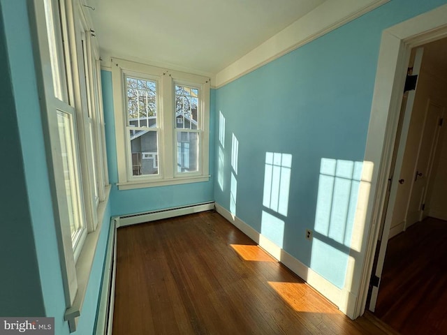 interior space featuring baseboard heating