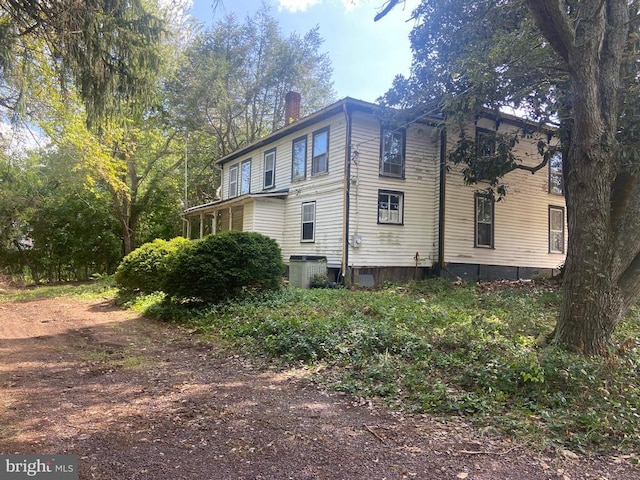 view of home's exterior featuring central AC unit