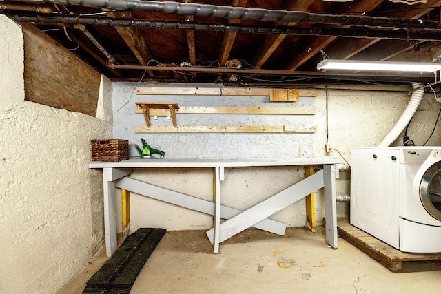 unfinished basement with washer / dryer