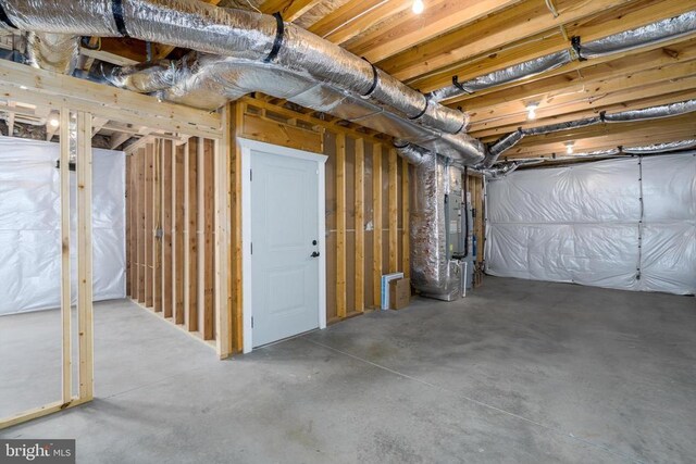 unfinished basement with heating unit