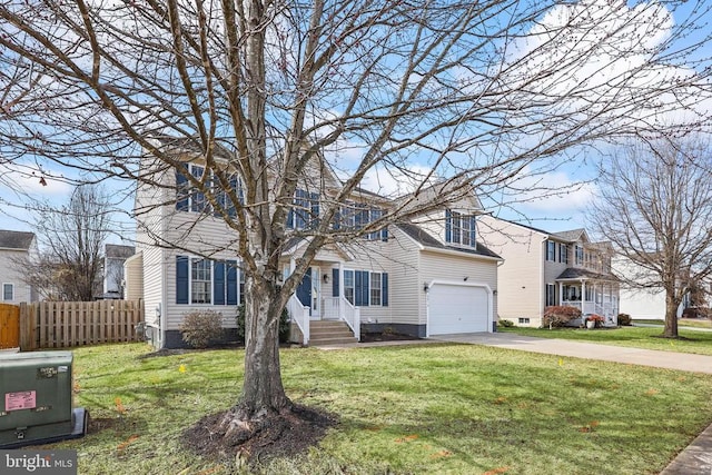 view of front facade with a garage, fence, concrete driveway, and a front yard