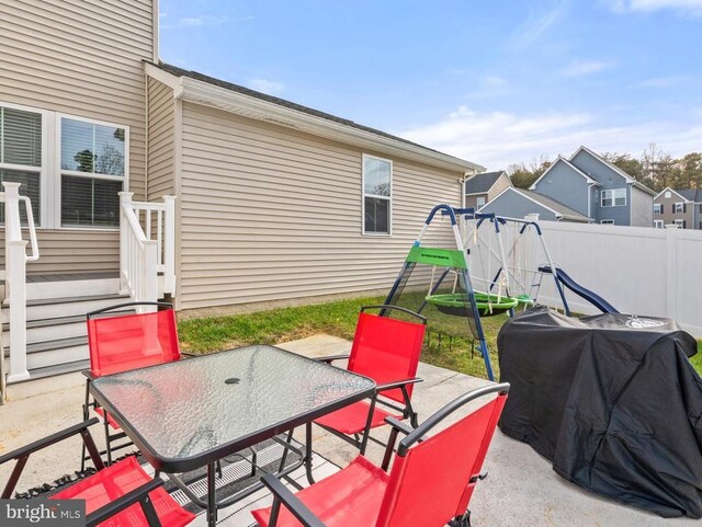 view of patio with a playground