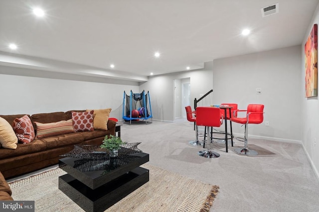 living room with light colored carpet