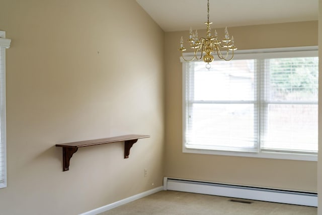 carpeted spare room featuring a baseboard heating unit, baseboards, and a chandelier