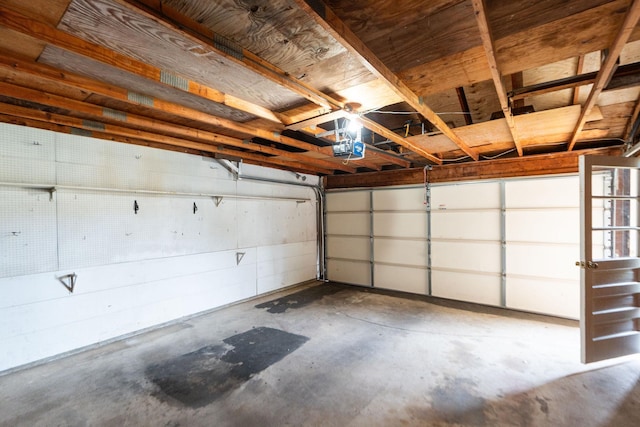 garage featuring a garage door opener