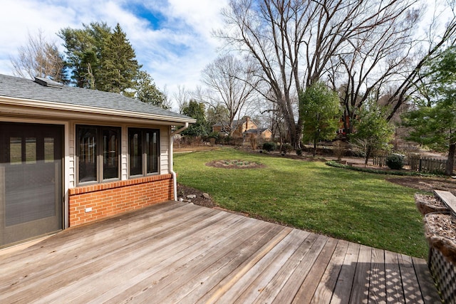 wooden deck with a yard