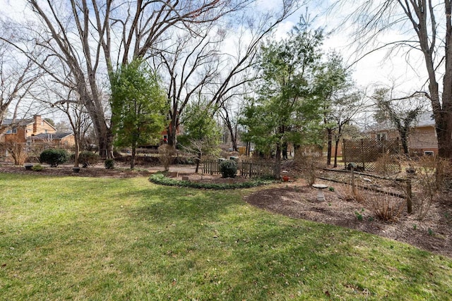 view of yard with fence