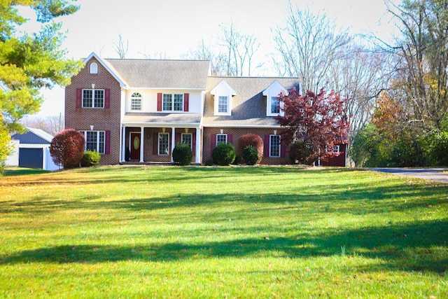 view of front of property with a porch and a front yard