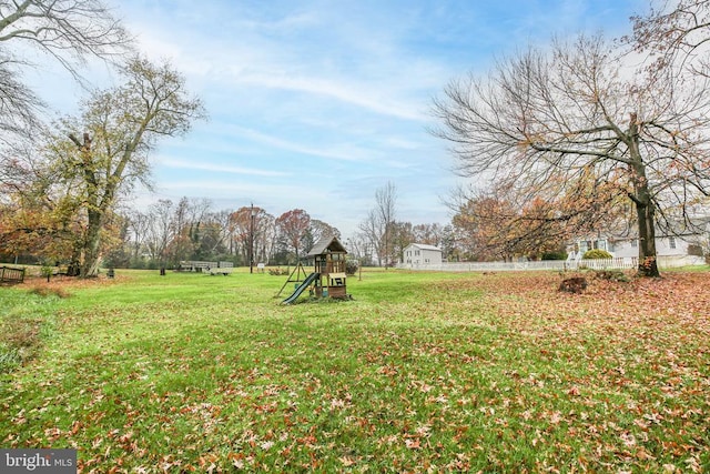 view of yard with a playground