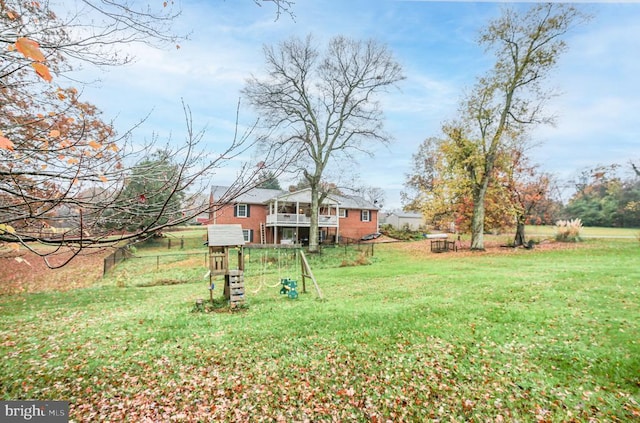 view of yard featuring a deck