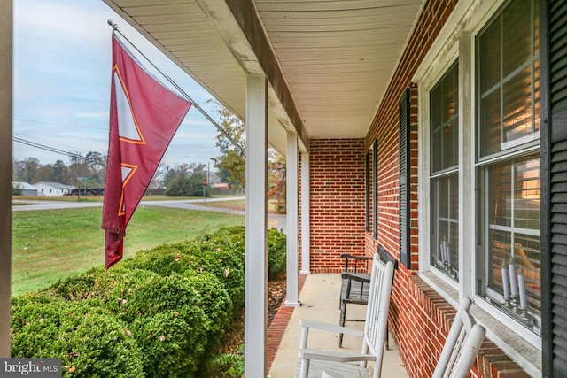 view of patio featuring a porch