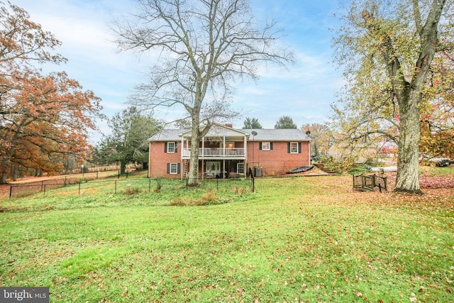 view of yard featuring a deck and fence