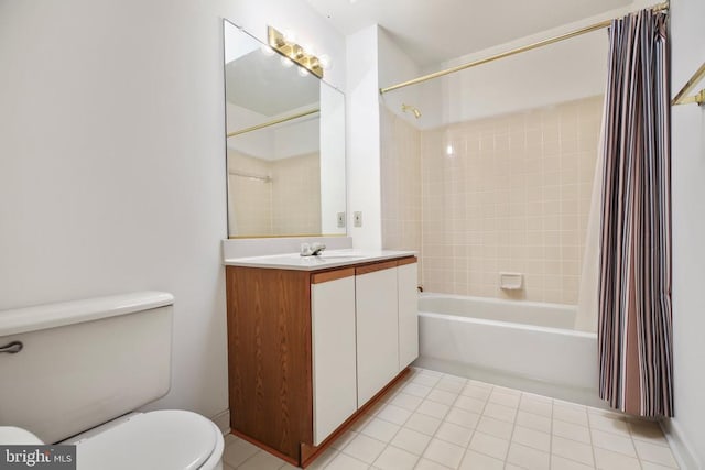 full bathroom with vanity, toilet, tile patterned flooring, and shower / tub combo