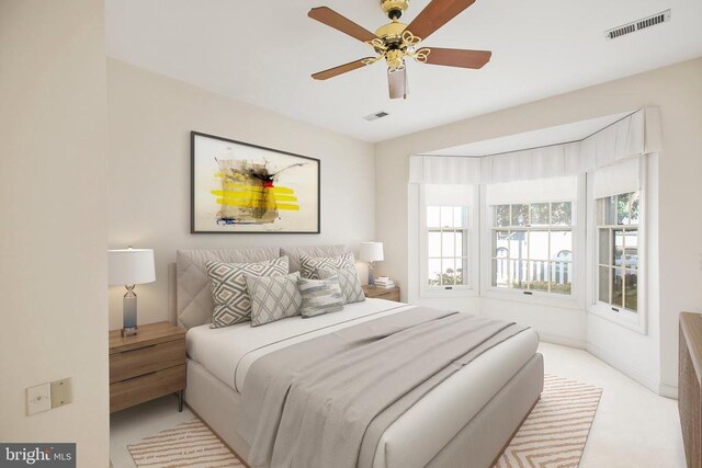 carpeted bedroom with ceiling fan