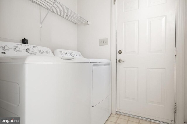 laundry area with washer and dryer