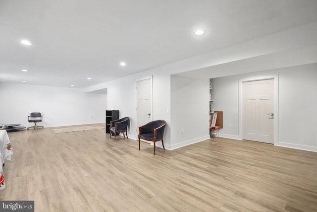 unfurnished room with light wood-type flooring