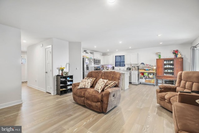 living room featuring light wood-type flooring