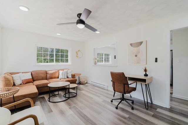 office area with recessed lighting, a baseboard radiator, ceiling fan, and wood finished floors