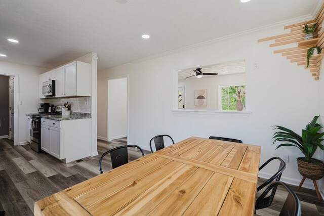 dining space featuring a ceiling fan, dark wood finished floors, baseboards, ornamental molding, and recessed lighting