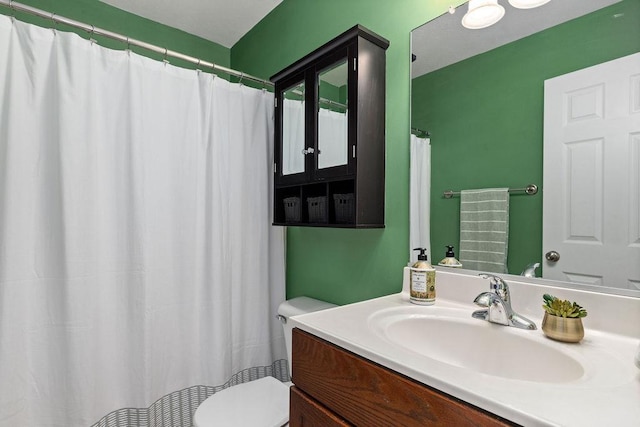full bath with vanity and toilet