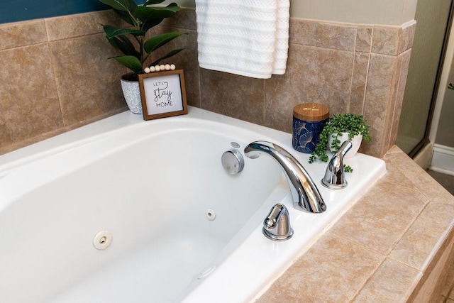 bathroom with a jetted tub