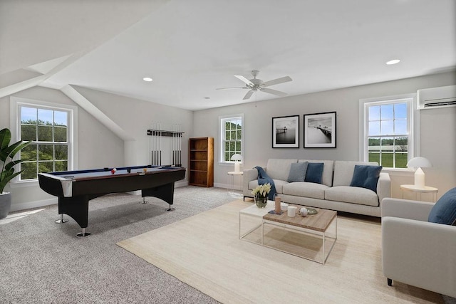 playroom with a wall mounted AC, billiards, a wealth of natural light, and light carpet