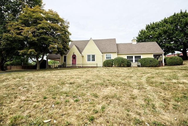 ranch-style house with a front lawn