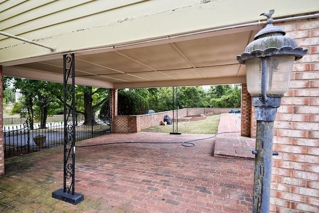 exterior space with fence and a patio