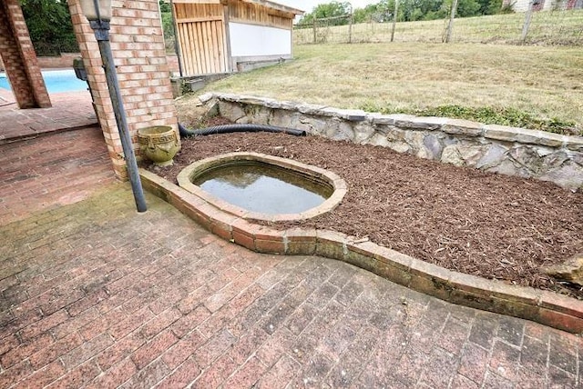 details with a hot tub and a swimming pool