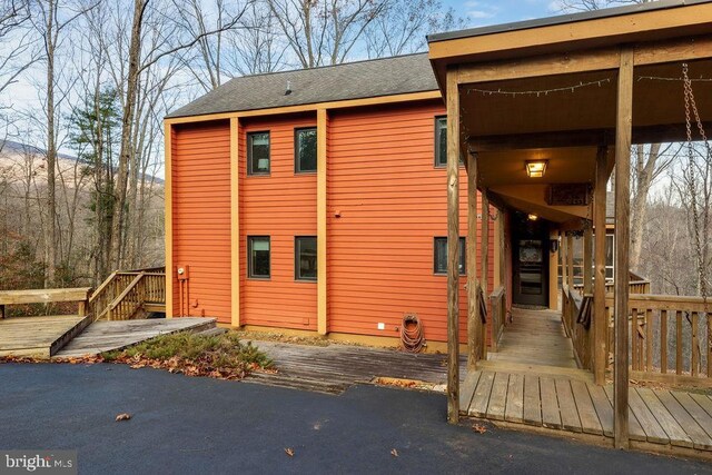 exterior space with a wooden deck