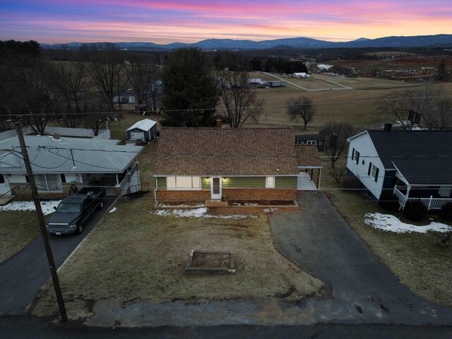 aerial view at dusk with a mountain view