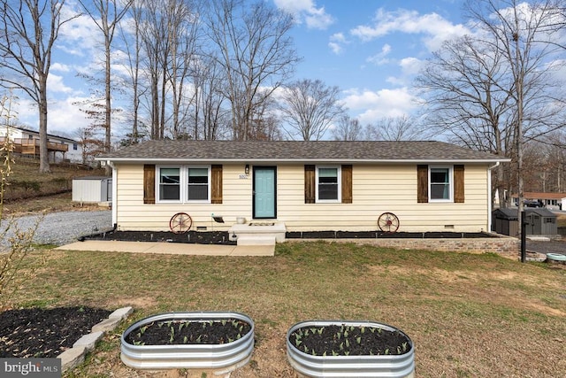 view of front of property featuring a shingled roof, a front lawn, a vegetable garden, and crawl space