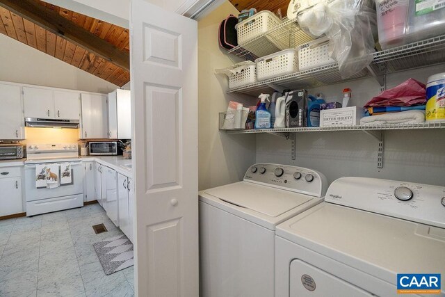 washroom featuring wood ceiling, laundry area, a toaster, and independent washer and dryer