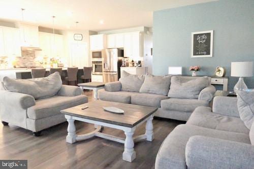 living room featuring dark wood finished floors