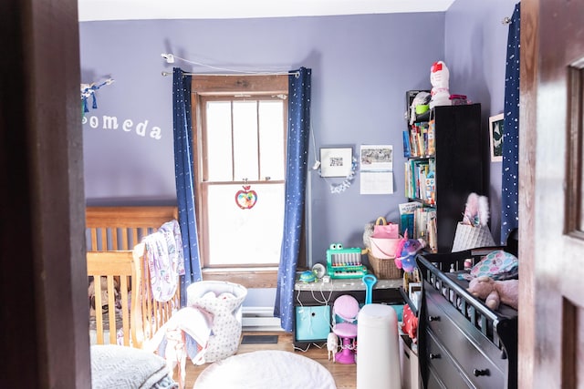 bedroom with wood finished floors