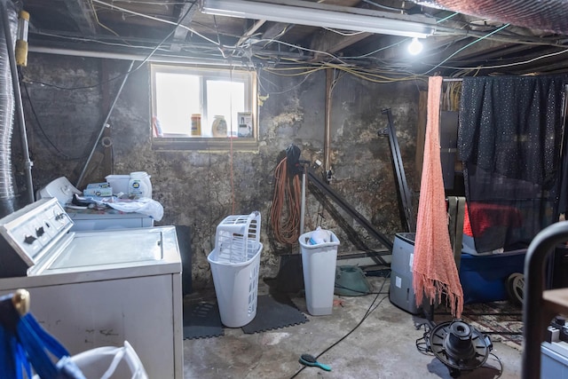 basement with washing machine and clothes dryer