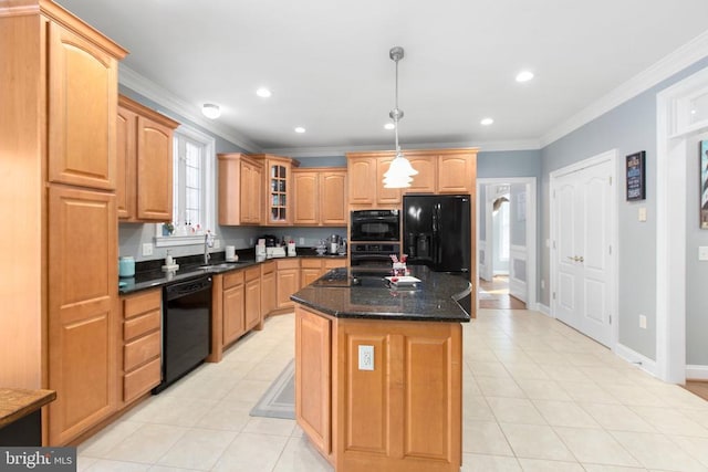 kitchen featuring ornamental molding, a kitchen island, pendant lighting, and black appliances